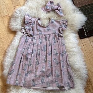 Cowkid Clothing Co mauve boot dress with matching hair bow. 4T. Like new.